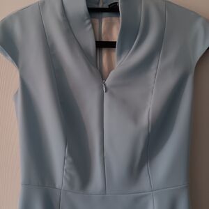 Nora Gardner, Elegant Light Blue Dress